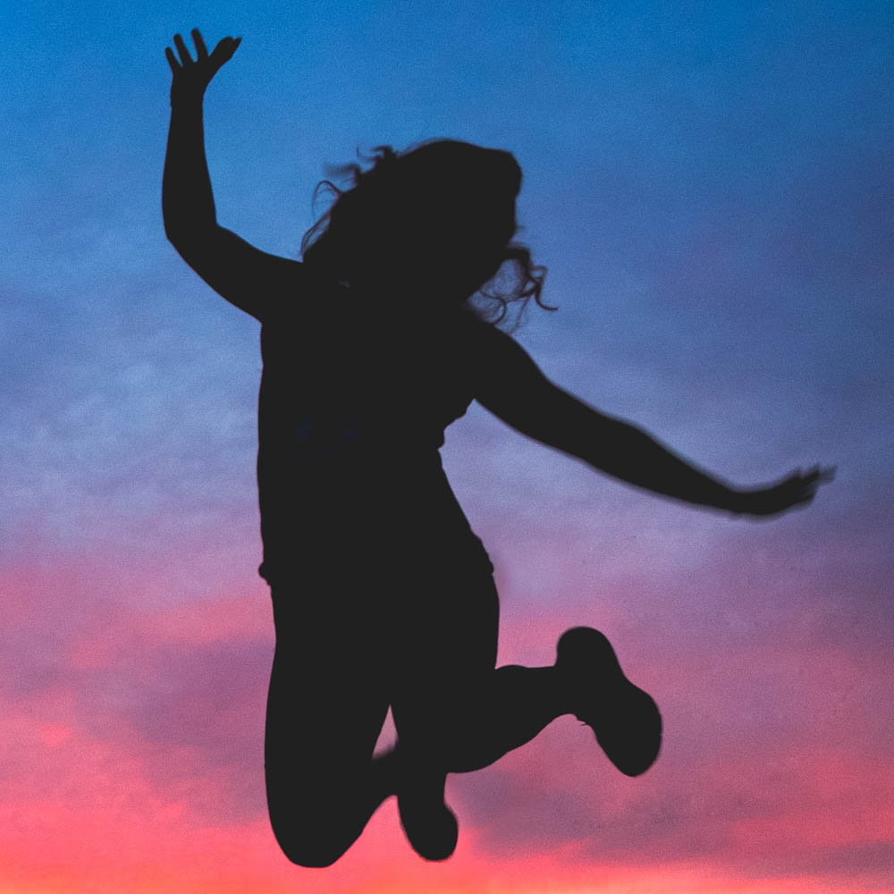 woman leaping for joy